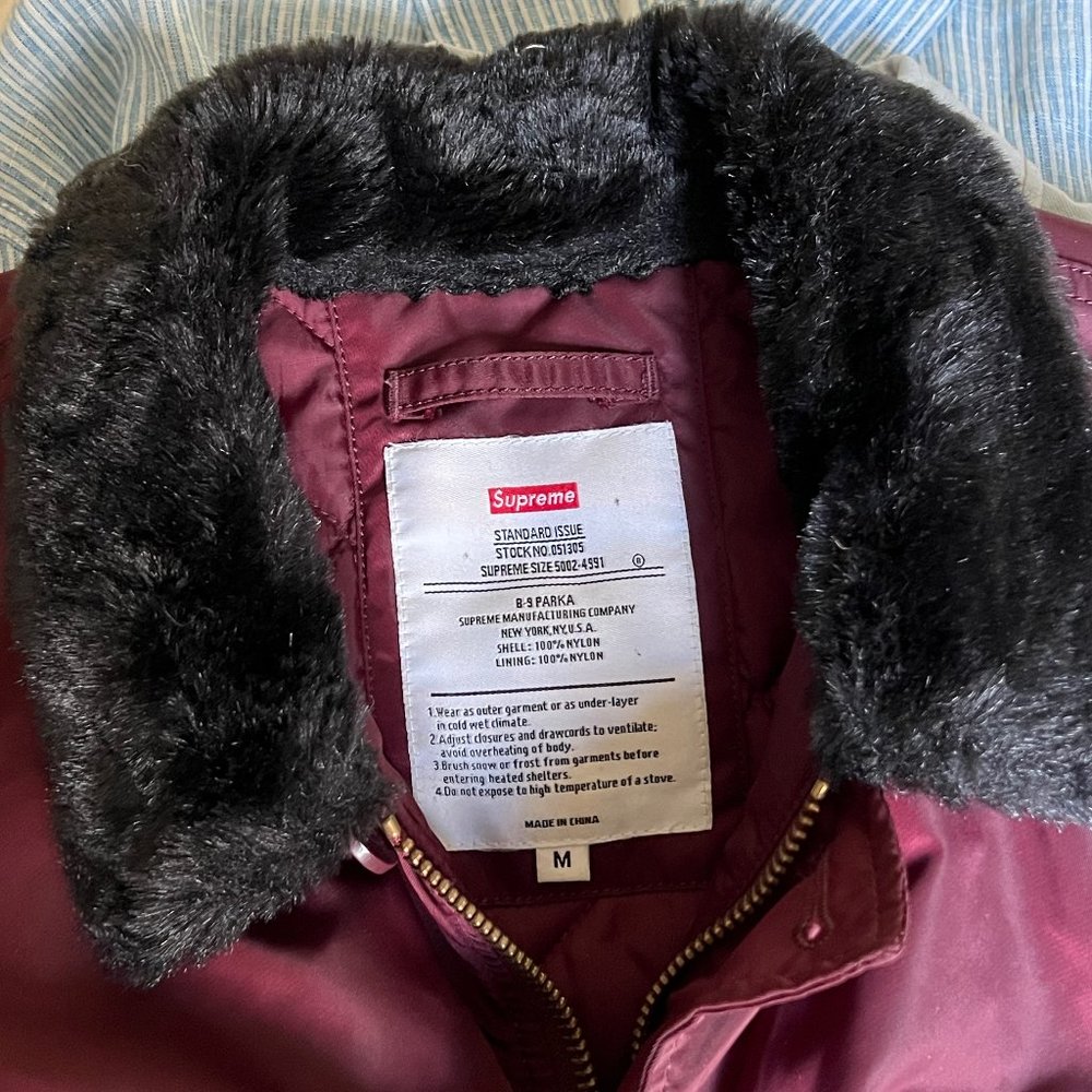 Supreme B-9 Parka in oxblood with black fur